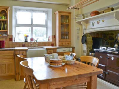 welcoming country kitchen in large house